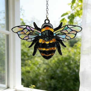 This is a Hand-Cut and Painted Colorful Bee Spring Glass Garden Suncatcher Stained Hanging Farmhouse